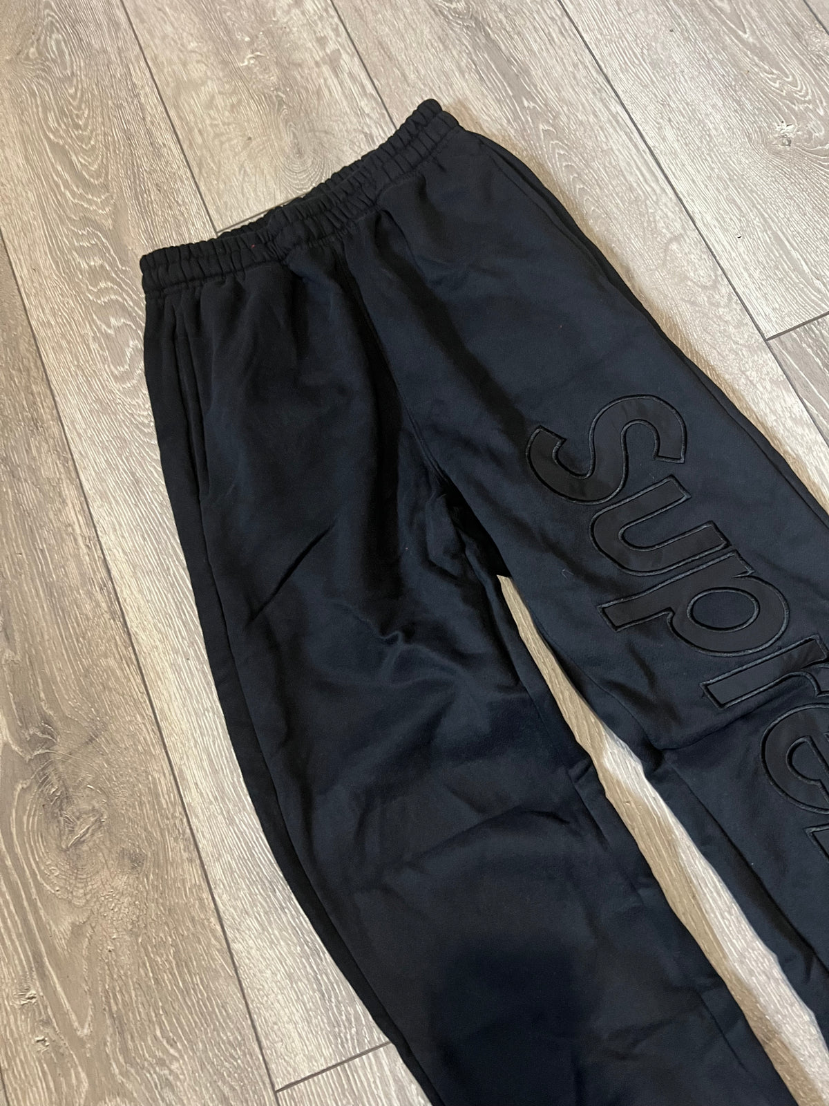 Black Supreme Satin Appliqué Joggers