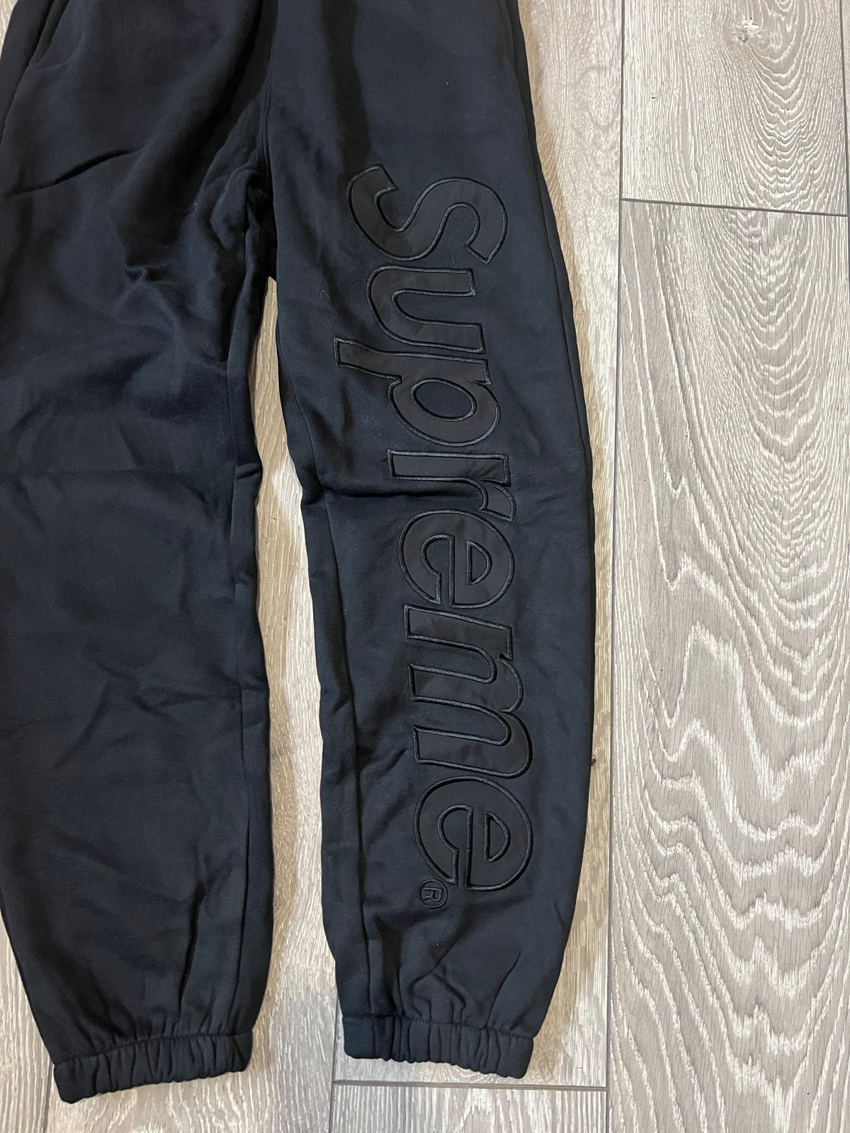 Black Supreme Satin Appliqué Joggers